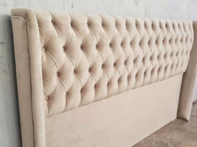Respaldo de cama tapizado en capitone gris - Tapiceria en Cordoba